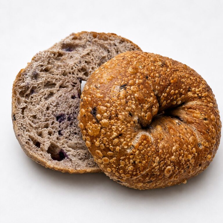 A fresh-baked bagel, sliced